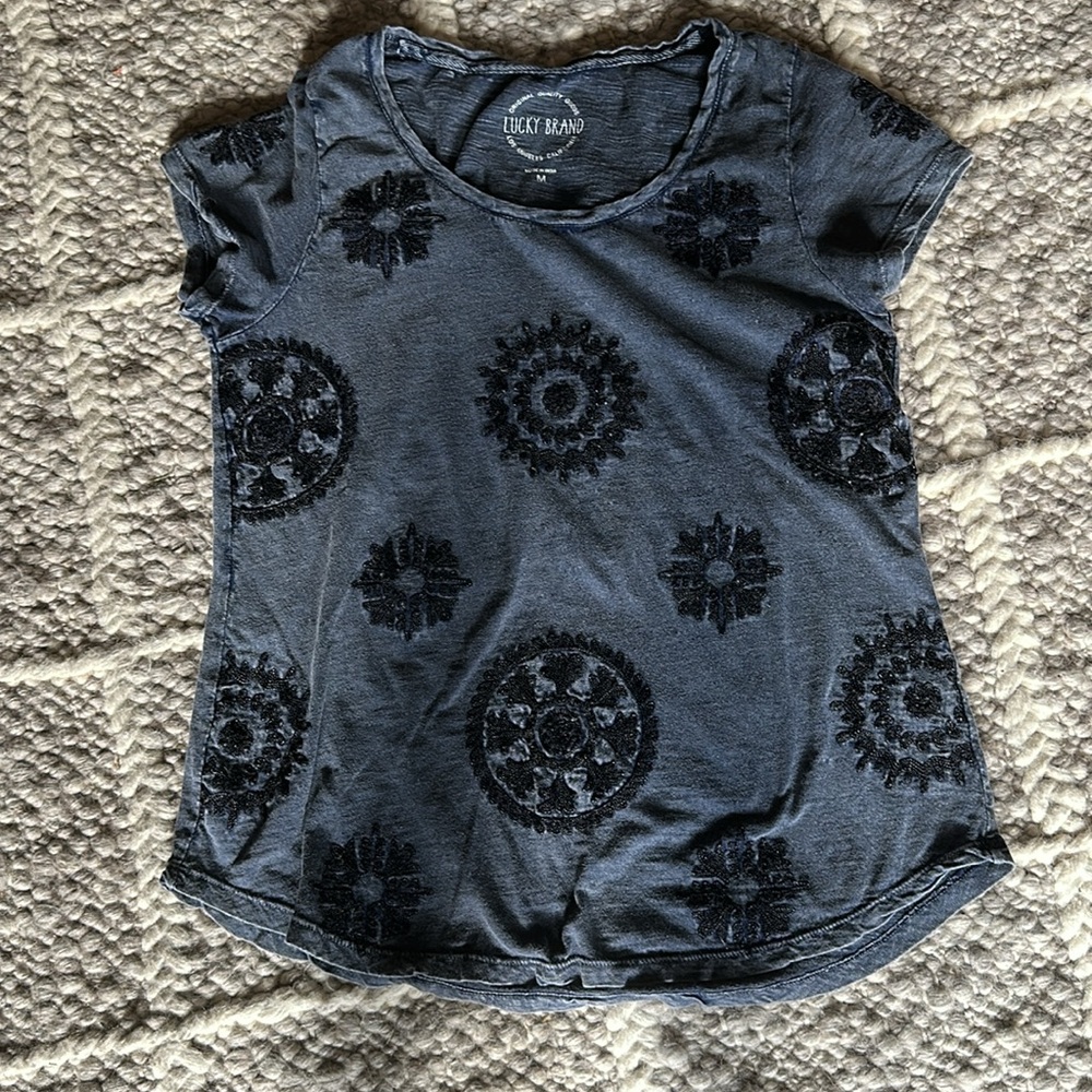 Lucky Brand Women's Charcoal /Blue Tee with Black Patterns.